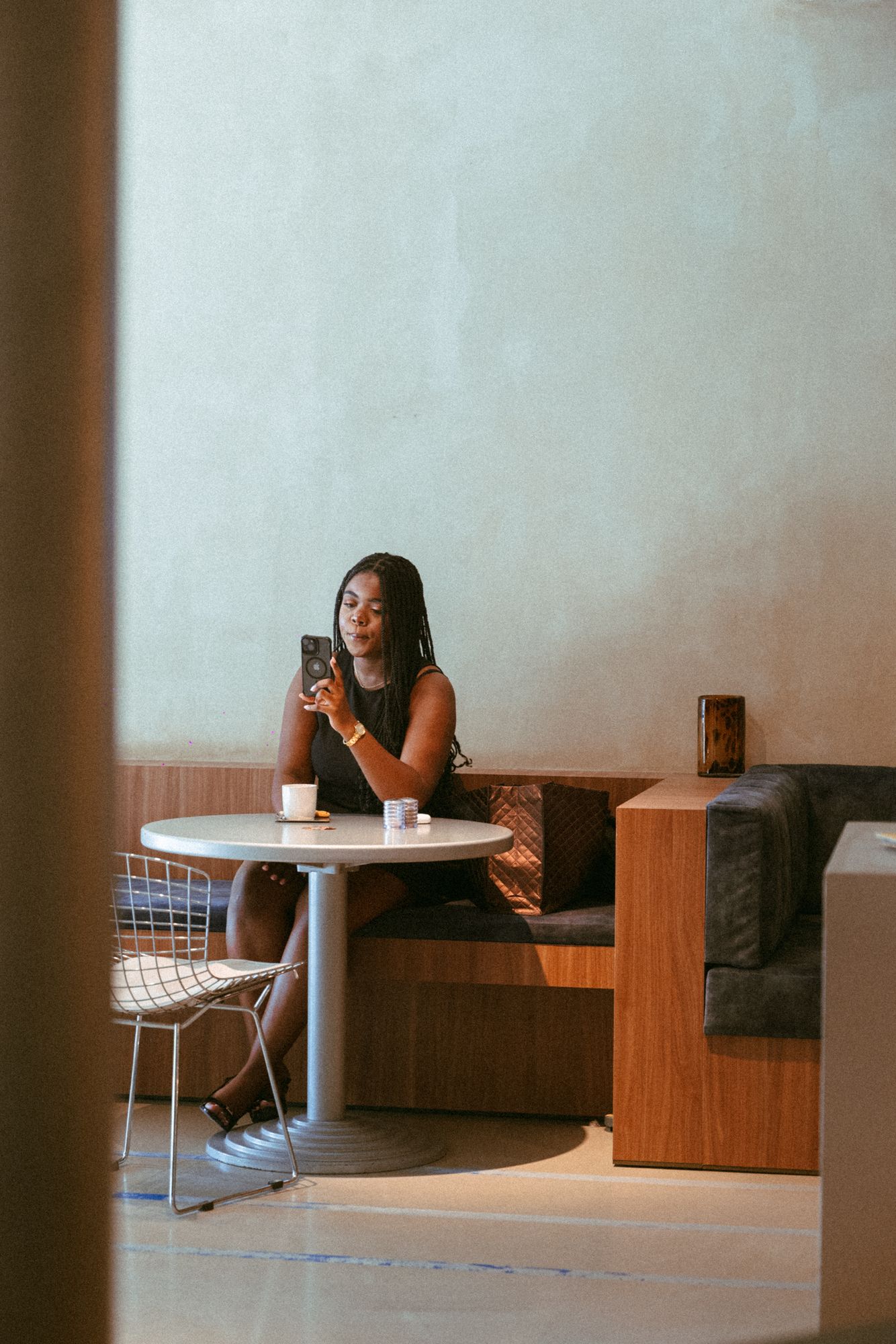 A guest at a table in the quiet corner of Claw